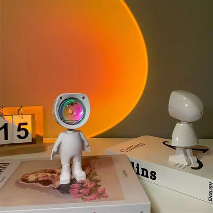 Transform Your Space with the LED Astronaut Night Light - 7 Color Sunset Projection and 360° Rotation